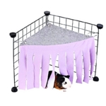 Purple fleece corner tent hideout clipped into the corner of a guinea pig cage.