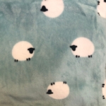 Green sheep snuggle pouch with soft fleece and double lining