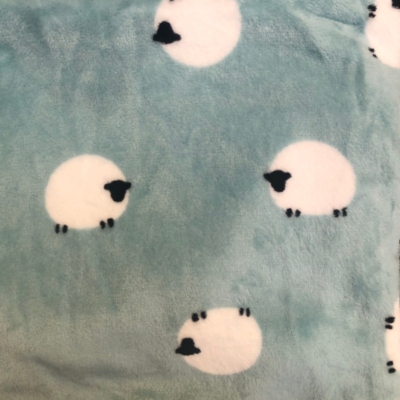 Green sheep snuggle pouch with soft fleece and double lining